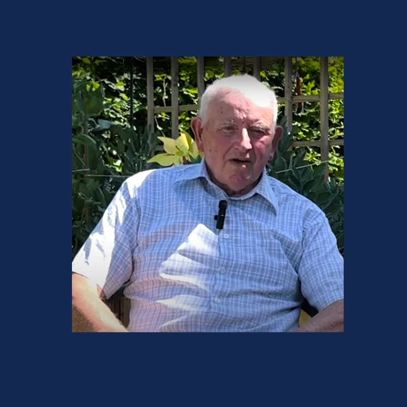 John, a Sue Ryder resident in Carlow, speaking in a garden