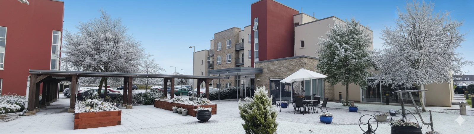 Sue Ryder Ireland residence courtyard and apartments in the snow